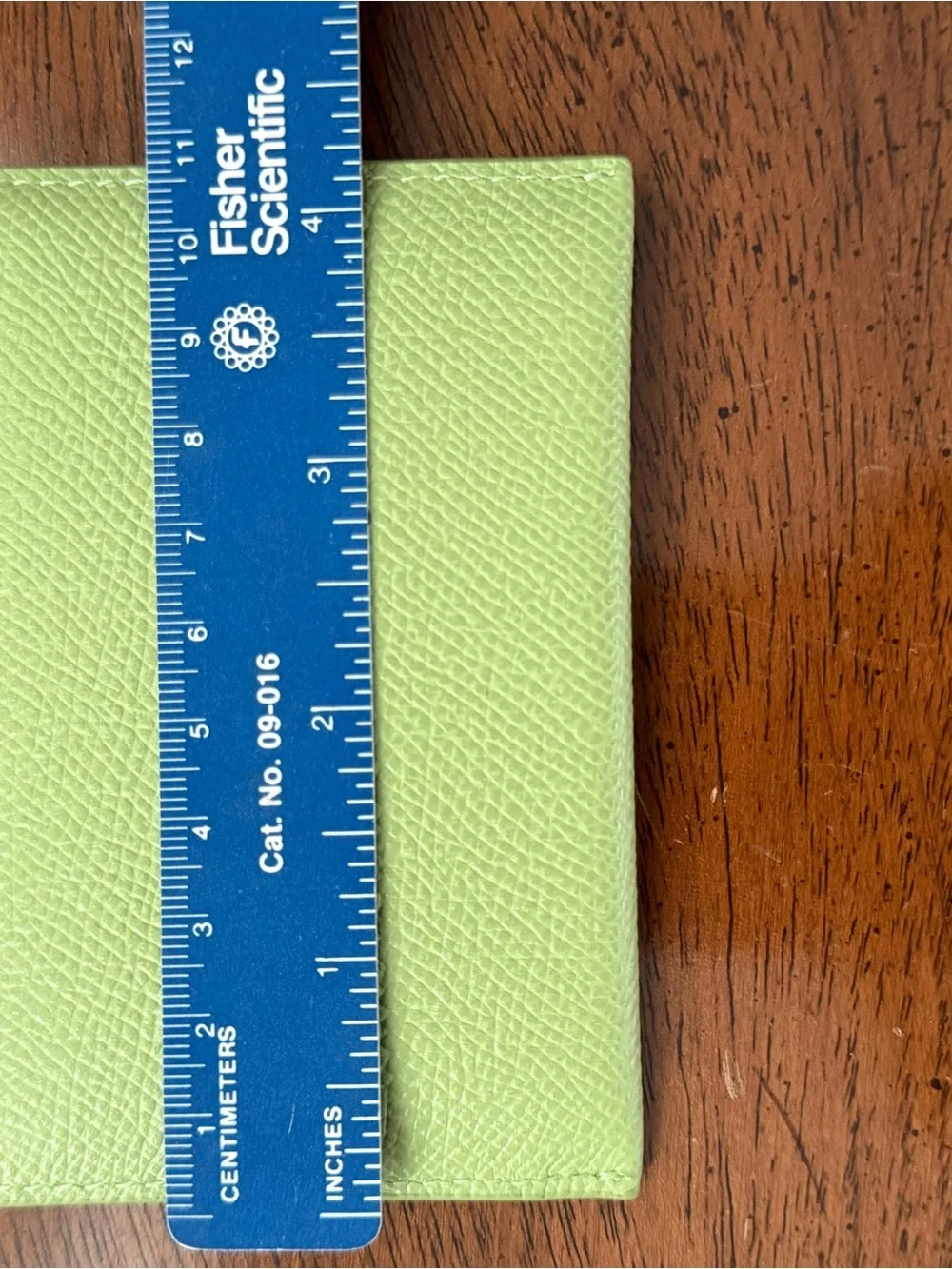 Set of 2 Dooney and Bourke Apple green leather envelopes. Gently used.